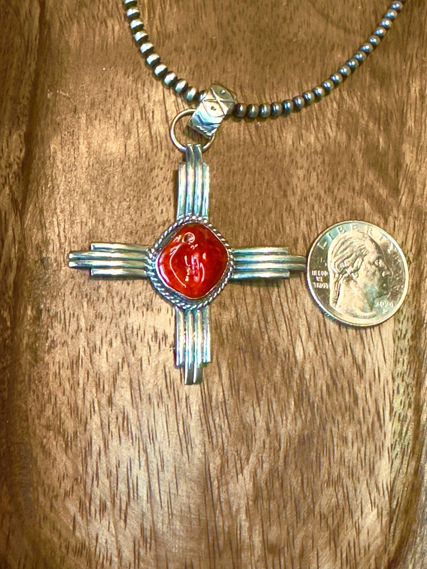 Stamped Sterling Silver and Mediterranean Coral Zia Pendant