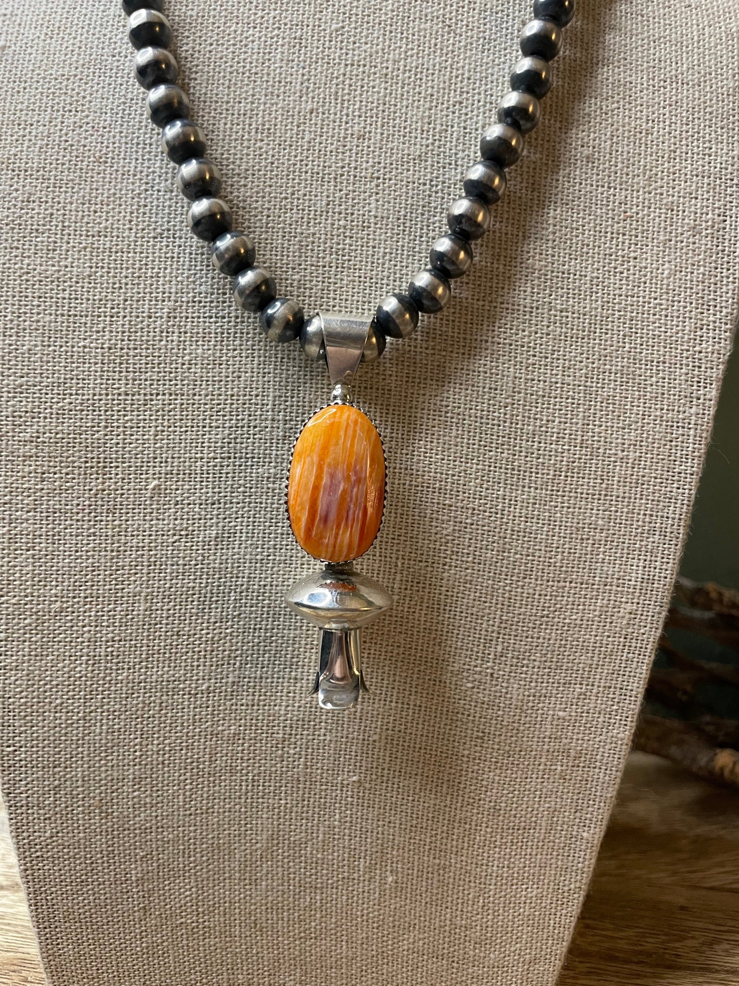Navajo Handmade Sterling Silver Orange Spiny Blossom Pendant